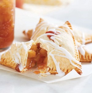 Plate of apple pie preserves drizzled in white glaze