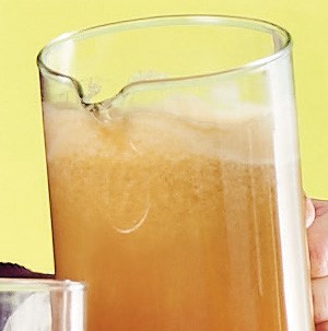 Pitcher of apple, pear and grape juice