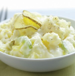 White bowl of potato salad