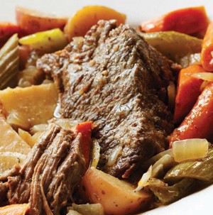 Pot roast mixed with roasted vegetables
