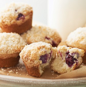 Plate of blackberry-vanilla muffins topped with streusel