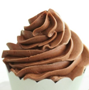 Cupcake topped with chocolate buttercream frosting