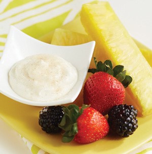 Side of creamy dip served with fresh fruit