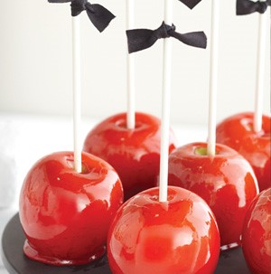 red candy coated apples
