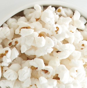 White popcorn in a white bowl