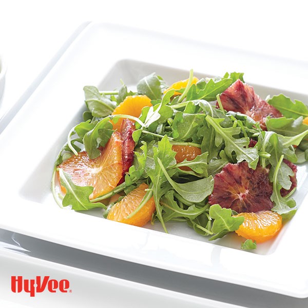 Dish of citrus salad with clementine-avocado vinaigrette