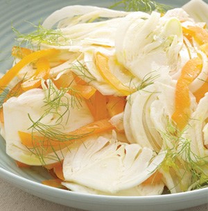 Sliced fennel, yellow onions and garnished with fennel fronds