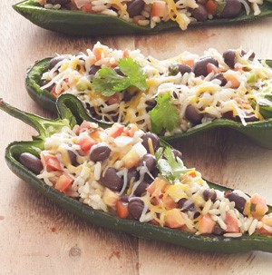 Poblano peppers stuffed with rice, beans, salsa, cheese and cilantro
