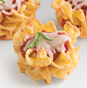 Spiral noodle cups with red sauce, melted cheese, and garnished with basil leaves