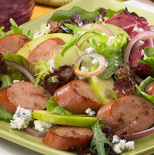 Plate of crisp apple and sausage salad