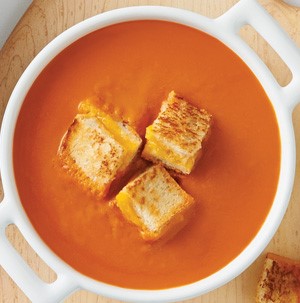 Bowl of tomato soup with croutons