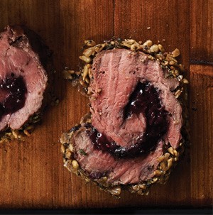 Beef tenderloin swirled with berry sauce and encrusted with sunflower kernels