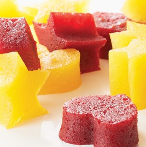Red and yellow fruit snacks cut out into hearts and stars