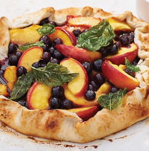 Pastry filled with peaches and blueberries