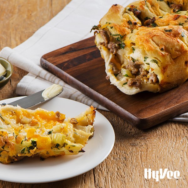 Plate of cheesy apple and sausage stuffing pull-apart bread