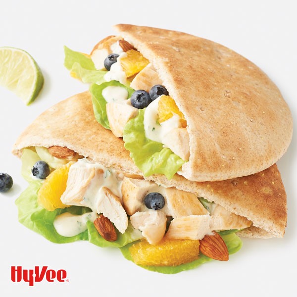 Two citrus chicken salad pitas