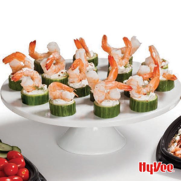 Cake platter of chilled shrimp and cucumber