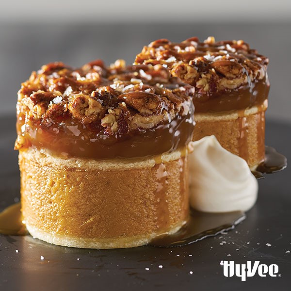 Rounds of pumpkin pie topped with rounds of pecan pie