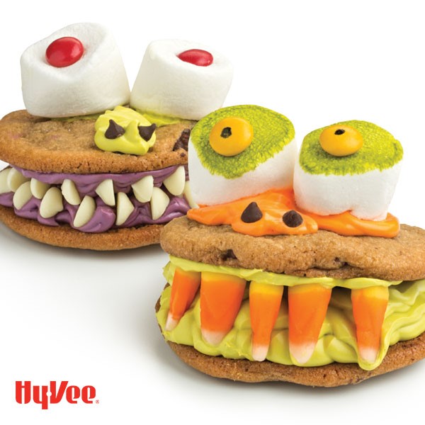 sandwich cookie with candy corn teeth and large marshmallow eyes