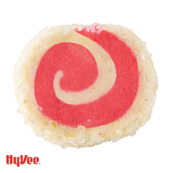 Pinwheel cookies spiraled with pink and white with coarse sugar