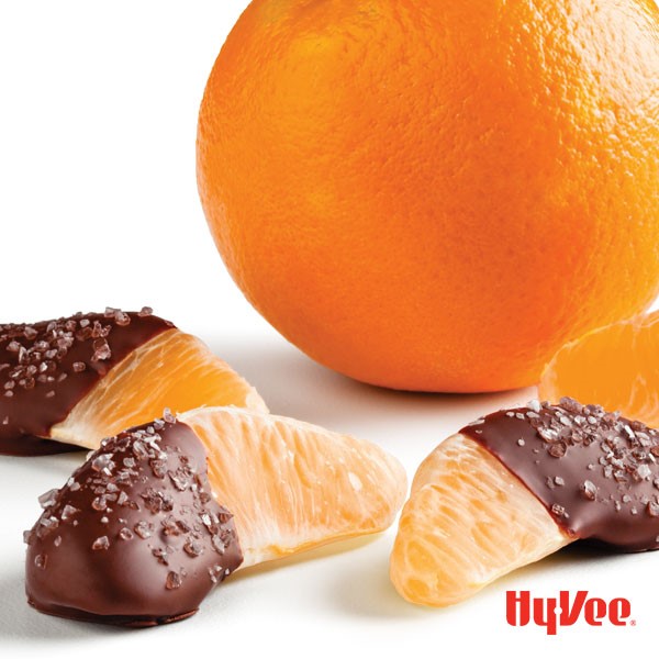 Chocolate-dipped orange slices sprinkled with coarse salt