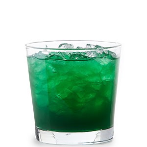 Green drink filled with ice cubes in a clear juice glass