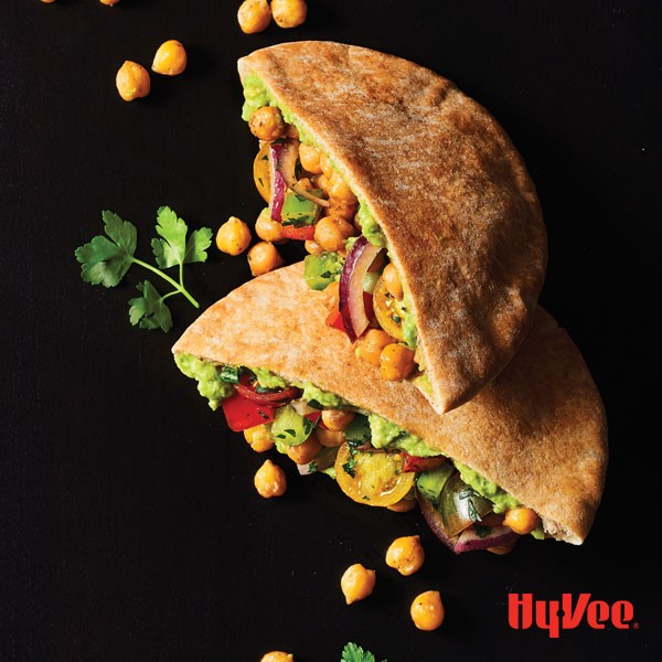 Pitas stuffed with chick peas, tomatoes, and avocados