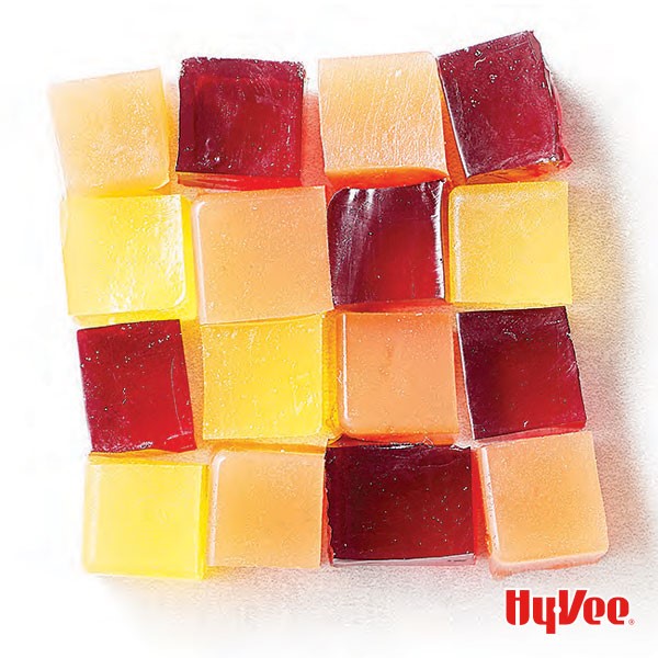 Multicolored homemade gelatin cubes forming a large square