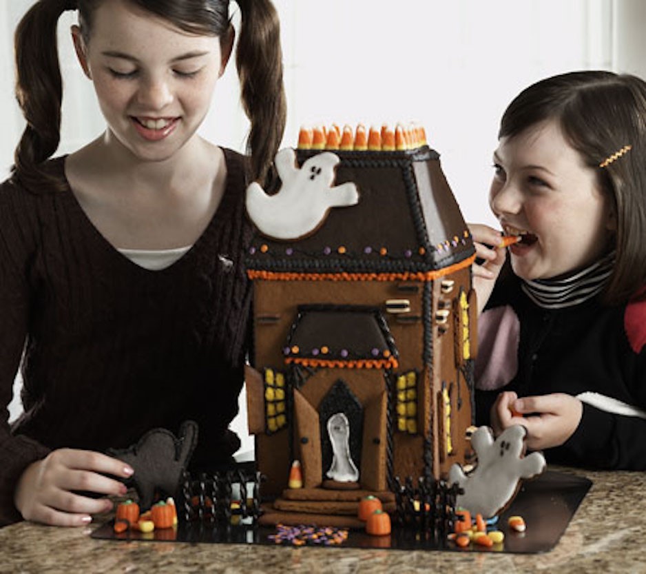 Complete Halloween Mansion with Two Children Eating Candy