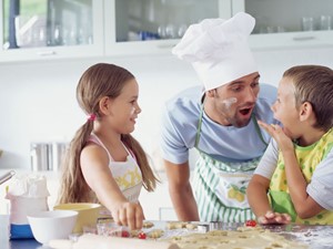 Children in Kitchen with Father