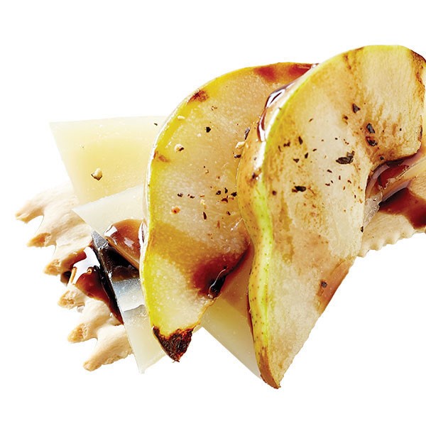 Crackers, Cheese Slices, Pear Wedges, and Balsamic Vinegar