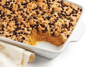9x13 baking dish with a serving missing and mini chocolate chips on top