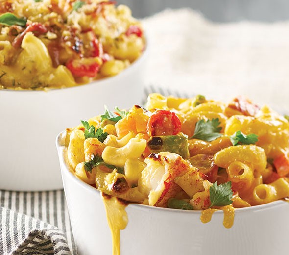 Cups of Macaroni and Cheese combined with Lobster Meat, Tomatoes and Parsley