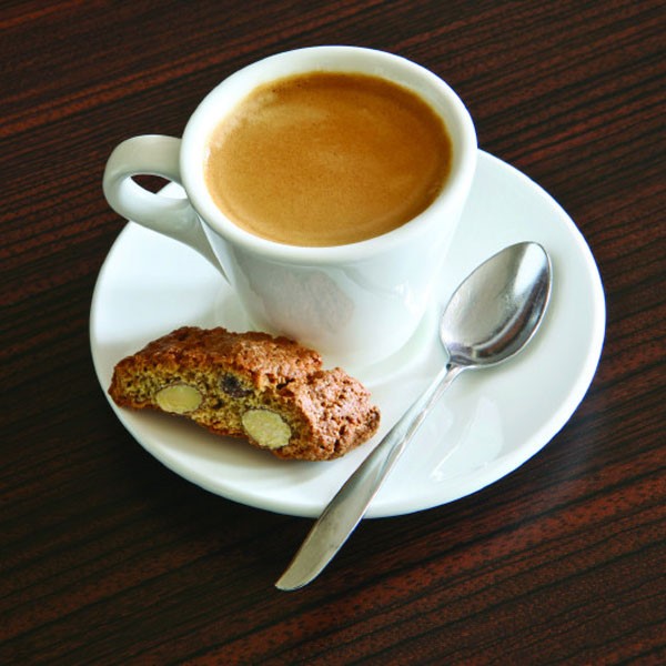 Coffee in Mug with Cookie and Spoon on Plate