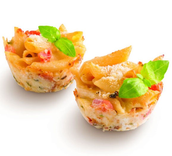 Mini appetizers made with penne pasta and Parmesan