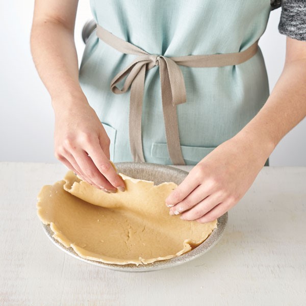 Bottom crust put into place in pie pan