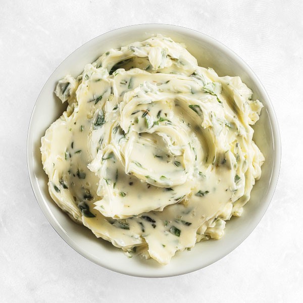 Whipped herb butter in small dish
