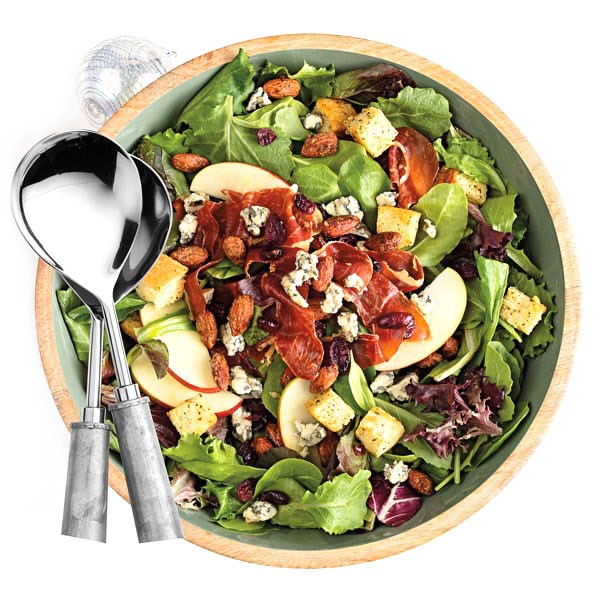 Hearty apple salad with cheese, croutons, cranberries, and crisped prosciutto 