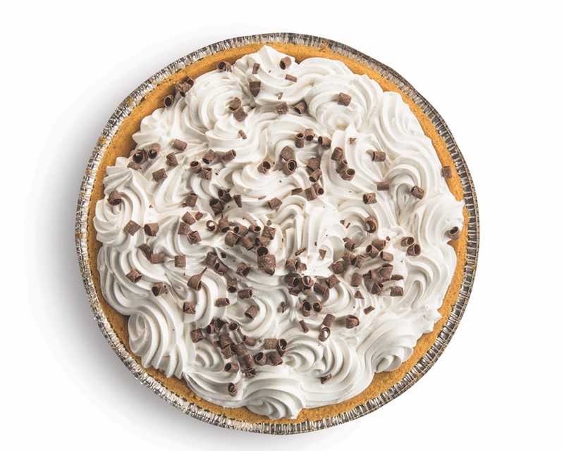 whole french silk pie covered in whipped cream and chocolate curls