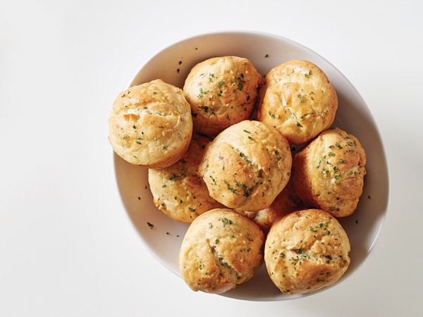 Herbed gluten-free dinner rolls with fresh chopped herbs