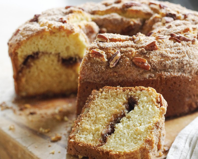 Coffee cake with a cinnamon-sugar filling and topped with cinnamon, sugar and pecans