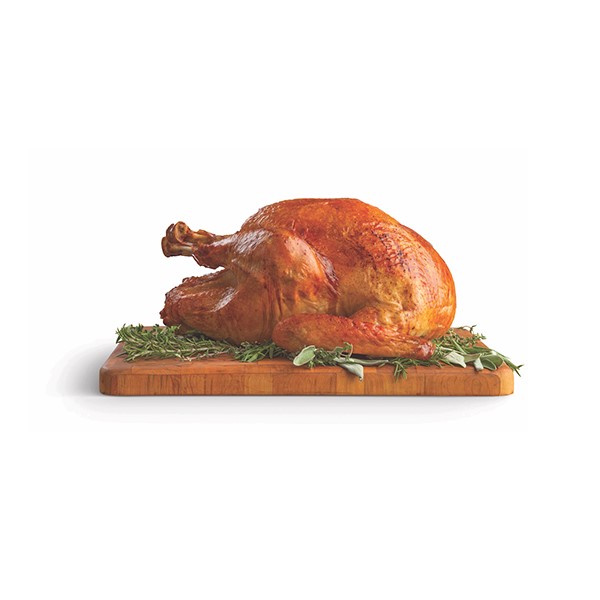 whole turkey on a carving board
